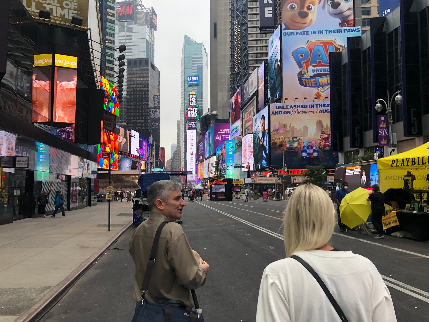 Jared showing guests the billboards of Times Square